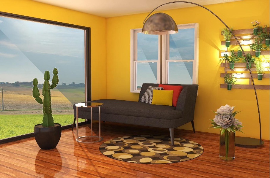 Wohnzimmer mit Sofa und verschiedenen Zimmerpflanzen